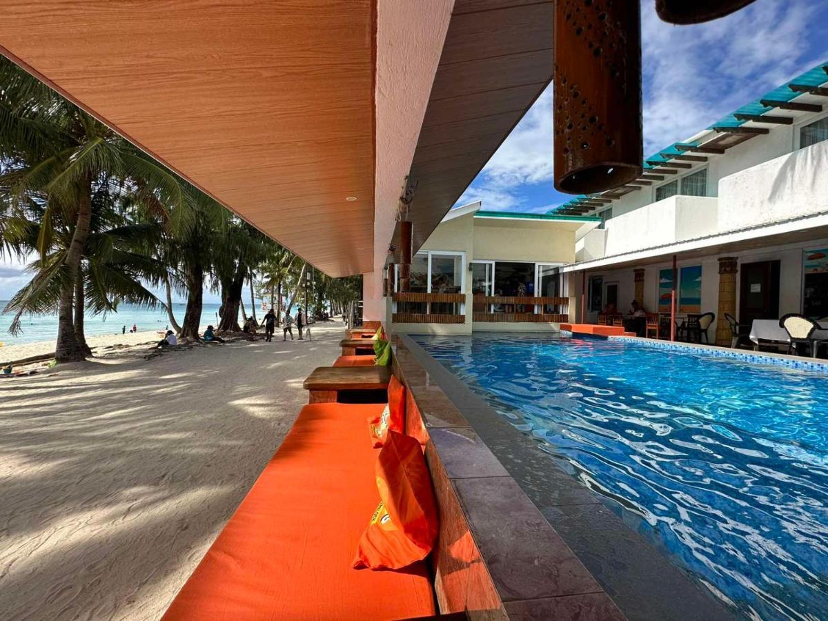 Calypso Beach And Dive Resort Manoc-Manoc Exterior foto