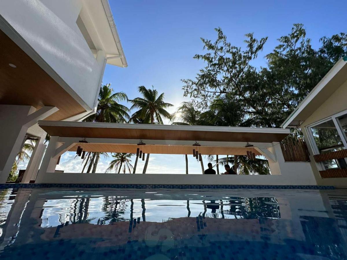 Calypso Beach And Dive Resort Manoc-Manoc Exterior foto