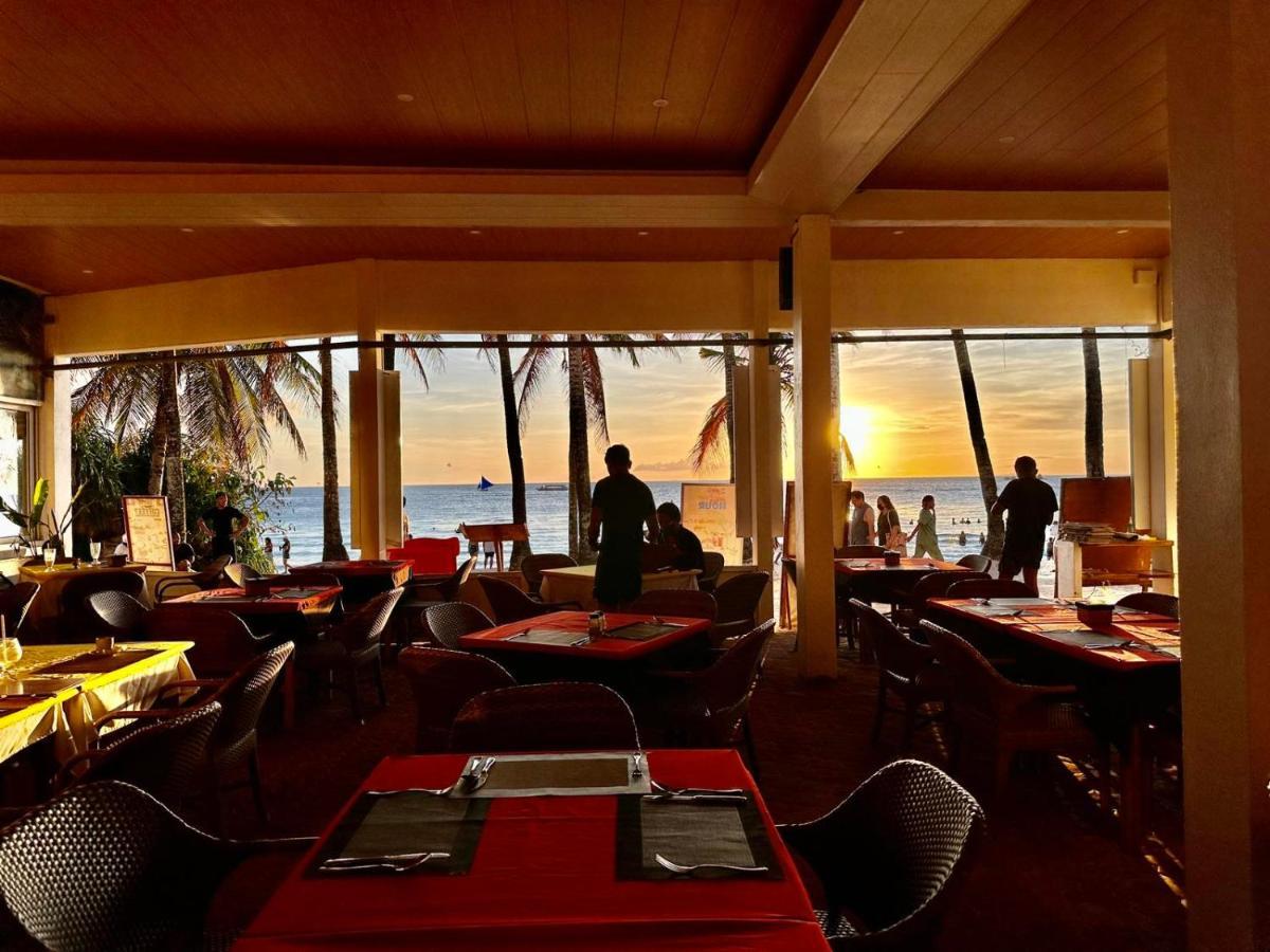 Calypso Beach And Dive Resort Manoc-Manoc Exterior foto