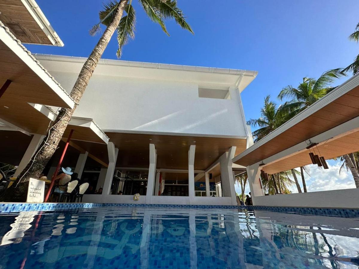 Calypso Beach And Dive Resort Manoc-Manoc Exterior foto