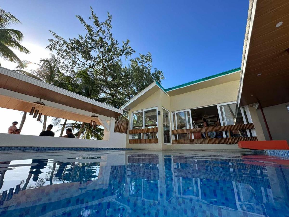 Calypso Beach And Dive Resort Manoc-Manoc Exterior foto