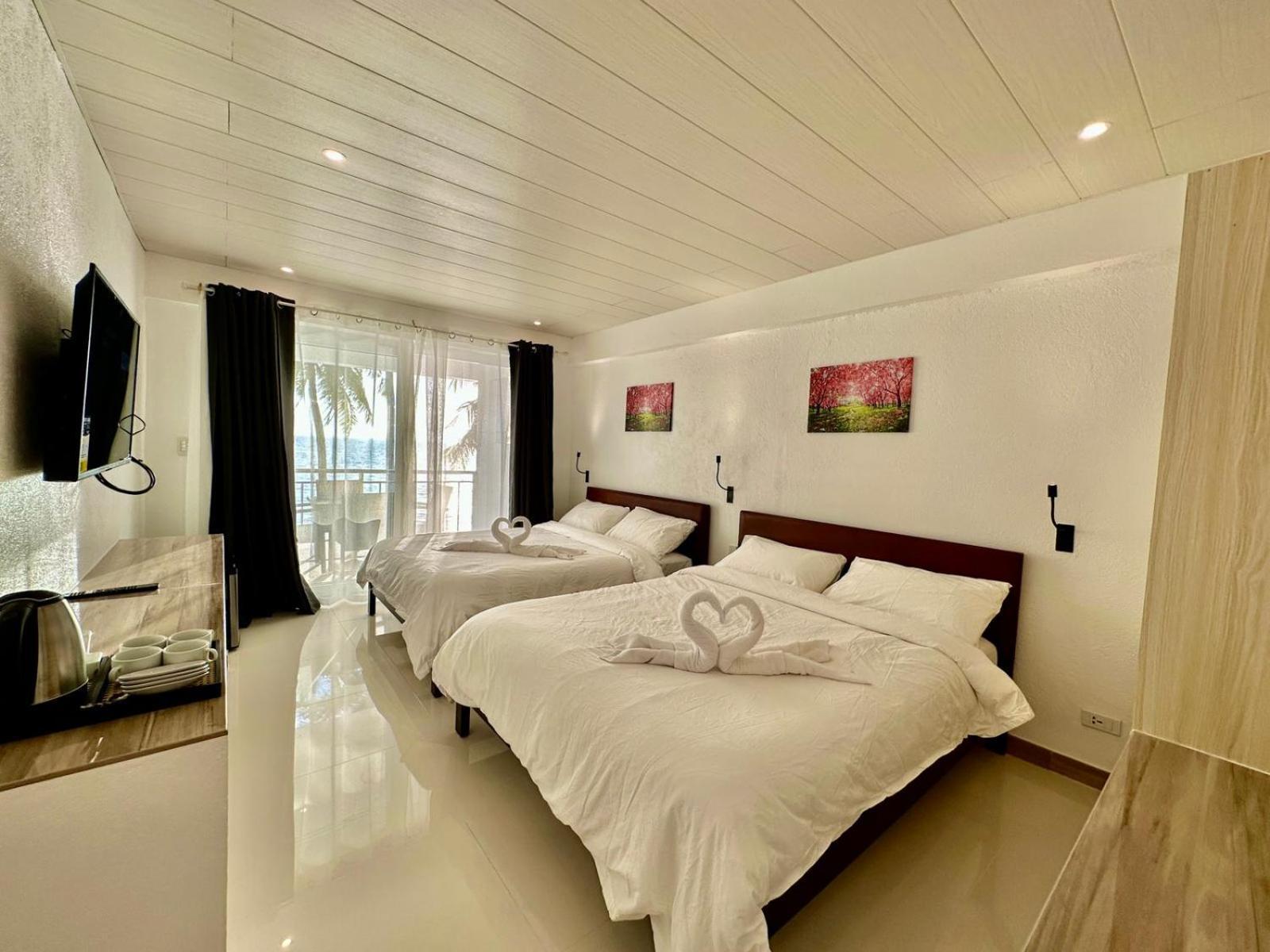 Calypso Beach And Dive Resort Manoc-Manoc Exterior foto