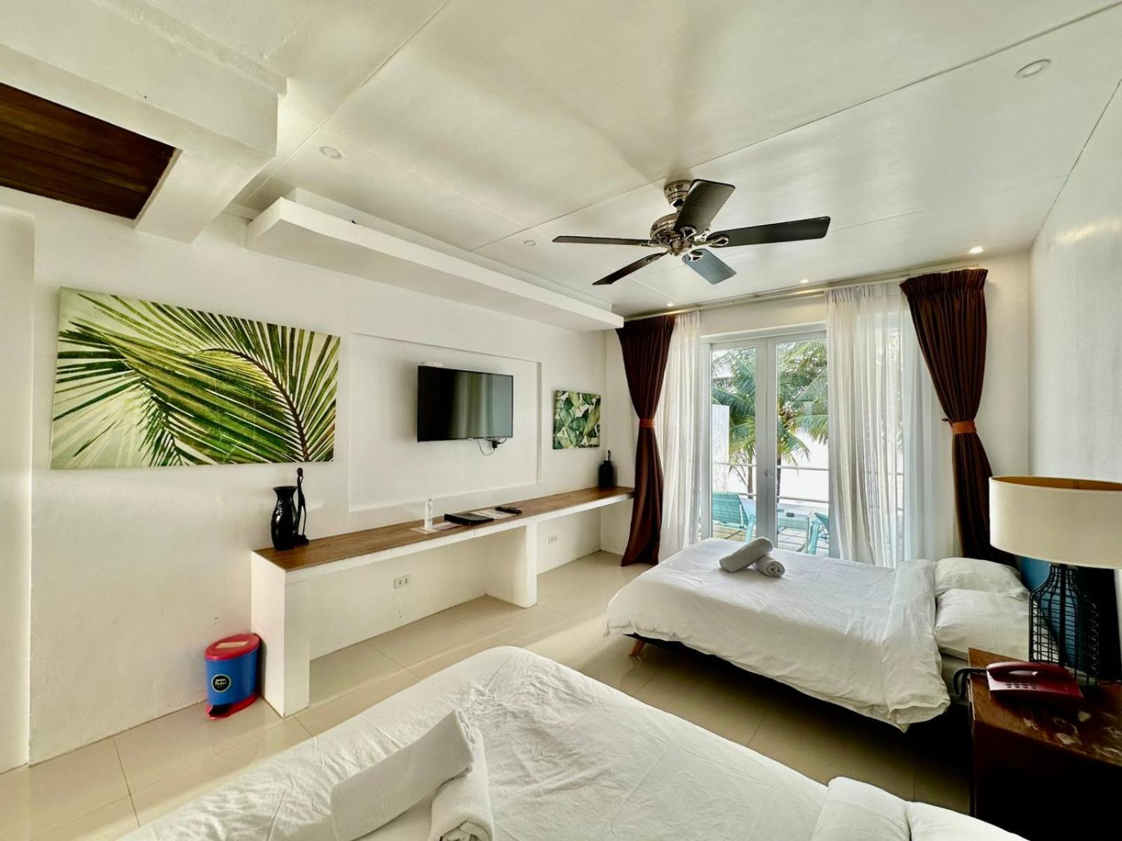 Calypso Beach And Dive Resort Manoc-Manoc Exterior foto