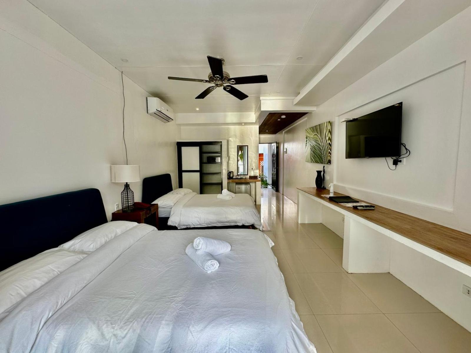 Calypso Beach And Dive Resort Manoc-Manoc Exterior foto