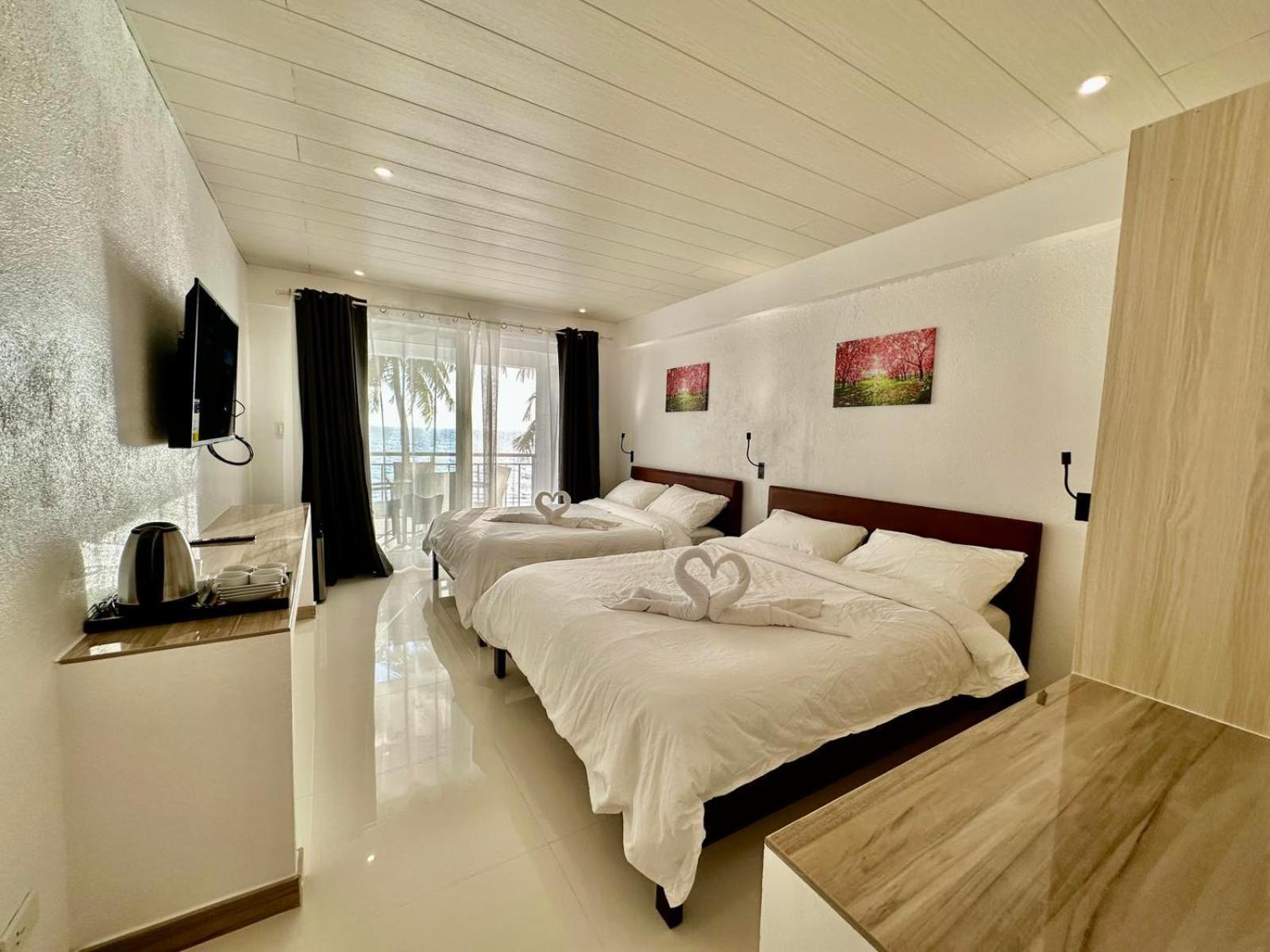 Calypso Beach And Dive Resort Manoc-Manoc Exterior foto