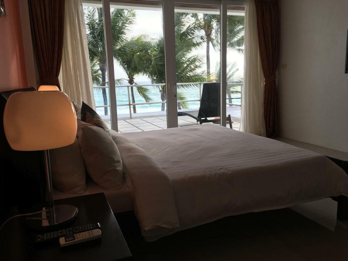 Calypso Beach And Dive Resort Manoc-Manoc Exterior foto