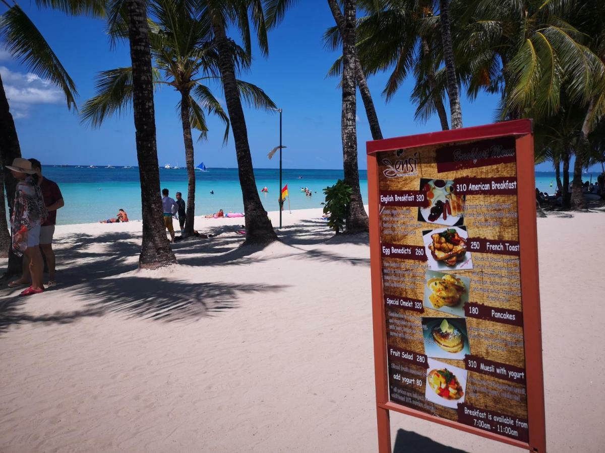 Calypso Beach And Dive Resort Manoc-Manoc Exterior foto