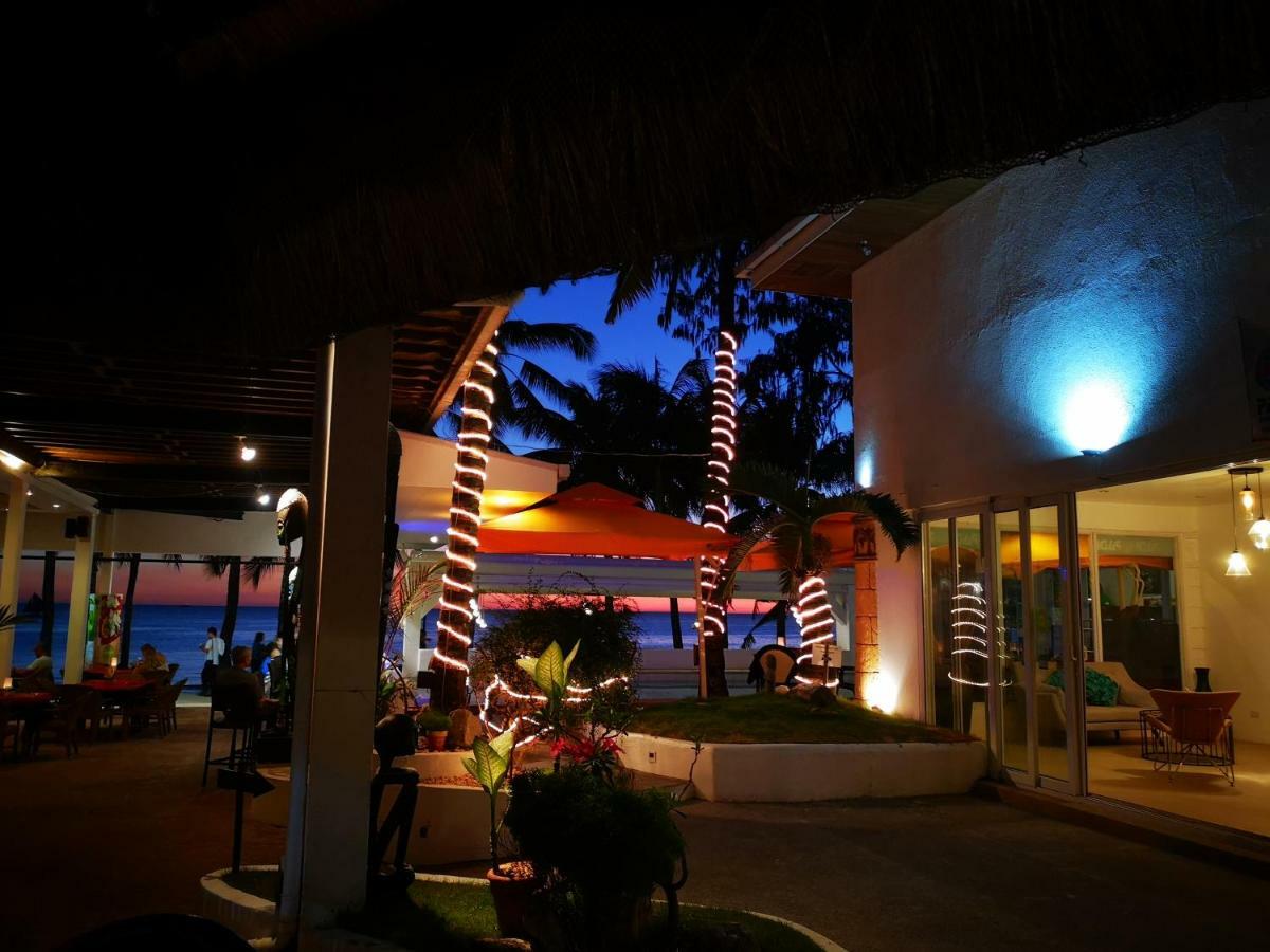 Calypso Beach And Dive Resort Manoc-Manoc Exterior foto