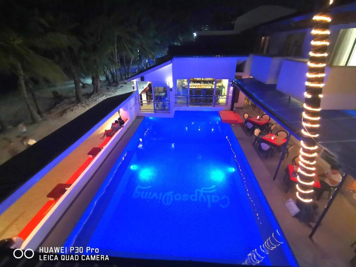 Calypso Beach And Dive Resort Manoc-Manoc Exterior foto